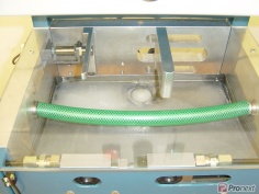 Single-purpose machine for lubricating headrest bars